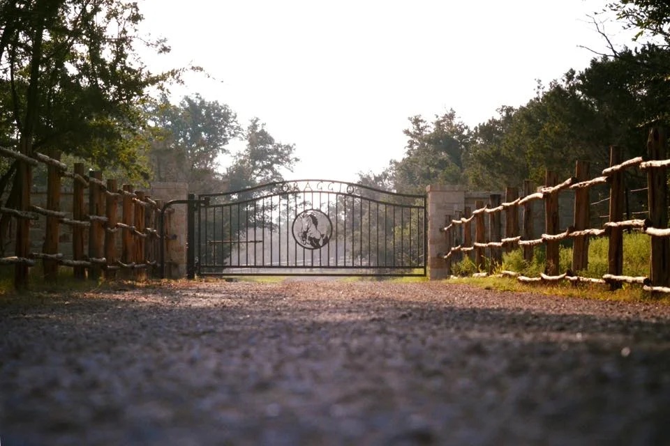 Gated entrance at Coraggio Equestrian